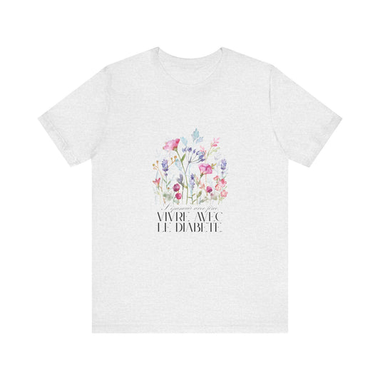 The Diabuddies Store Blossoming Strong, Living with Diabetes. (French) Unisex Tee Blossoming Strong, Living with Diabetes. (French) Unisex Tee: Wear your strength proudly! Our "S'épanouir avec force, vivre avec le diabète." Unisex Tee is a beautiful remin