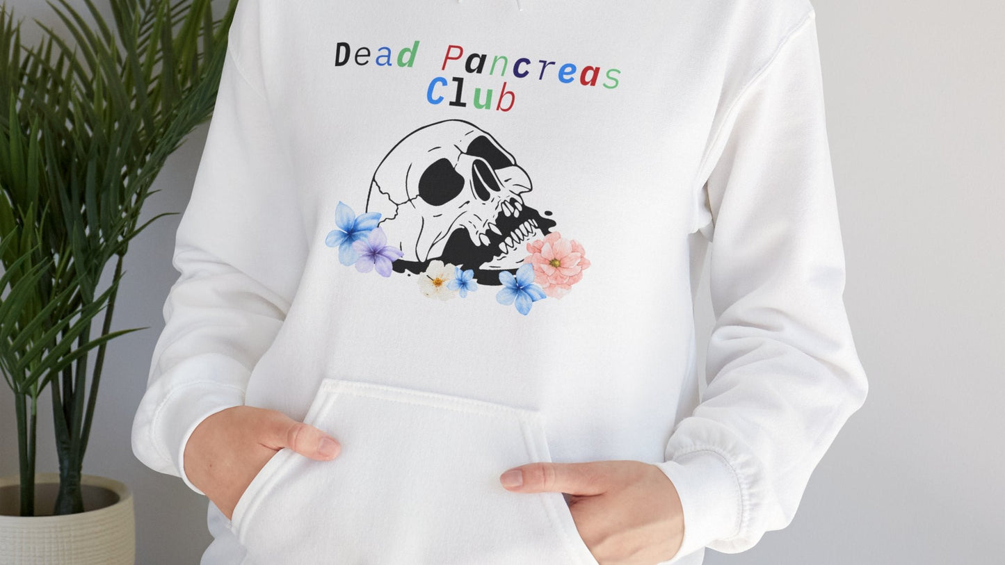 The Diabuddies Store Skull & Flowers, Dead Pancreas Club - Unisex Hoodie Skull & Flowers, Dead Pancreas Club - Unisex Hoodie: Cozy defiance! This unique hoodie blends skulls, flowers, and "Dead Pancreas Club" for a raw, humorous take on life with diabetes