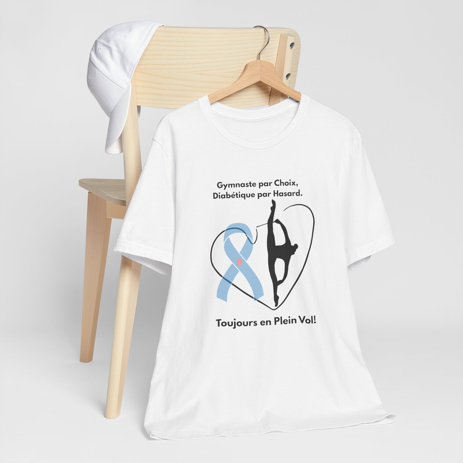 The Diabuddies Store Diabetes & Gymnastics (French) - Unisex Tee Diabetes & Gymnastics (French) - Unisex Tee: Defy expectations and tumble forward! This comfortable racerback tank is designed for the resilient gymnast who manages diabetes with grace and s