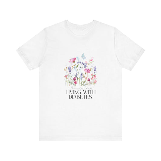 The Diabuddies Store Blossoming Strong, Living with Diabetes. - Unisex Tee Blossoming Strong, Living with Diabetes. - Unisex Tee: Wear your strength proudly! Our "Blossoming Strong, Living with Diabetes" Unisex Tee is a beautiful reminder of your inner po