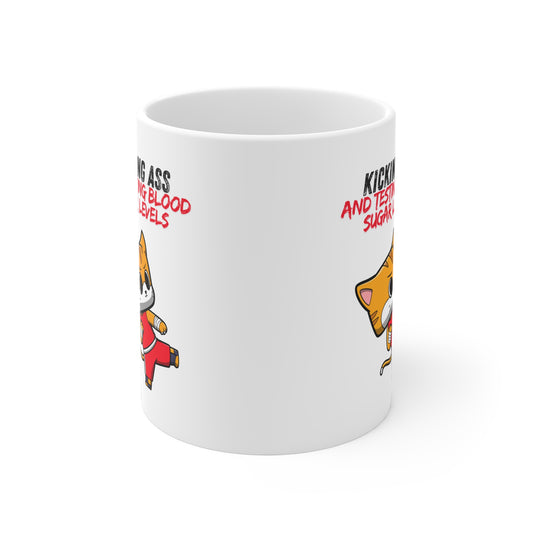 The Diabuddies Store Kicking Ass and Testing Blood Sugar Levels - Mug 11oz Kicking Ass and Testing Blood Sugar Levels - 11oz Mug: Fuel your day with our "Kicking Ass and Testing Blood Sugar Levels" 11oz ceramic mug! It's the perfect way to celebrate the d