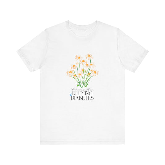 The Diabuddies Store Cultivating Hope, Defying Diabetes - Unisex Tee Cultivating Hope, Defying Diabetes - Unisex Tee: Wear your message of strength! Our "Cultivating Hope, Defying Diabetes" Unisex Tee is more than just a comfortable shirt; it's a powerful