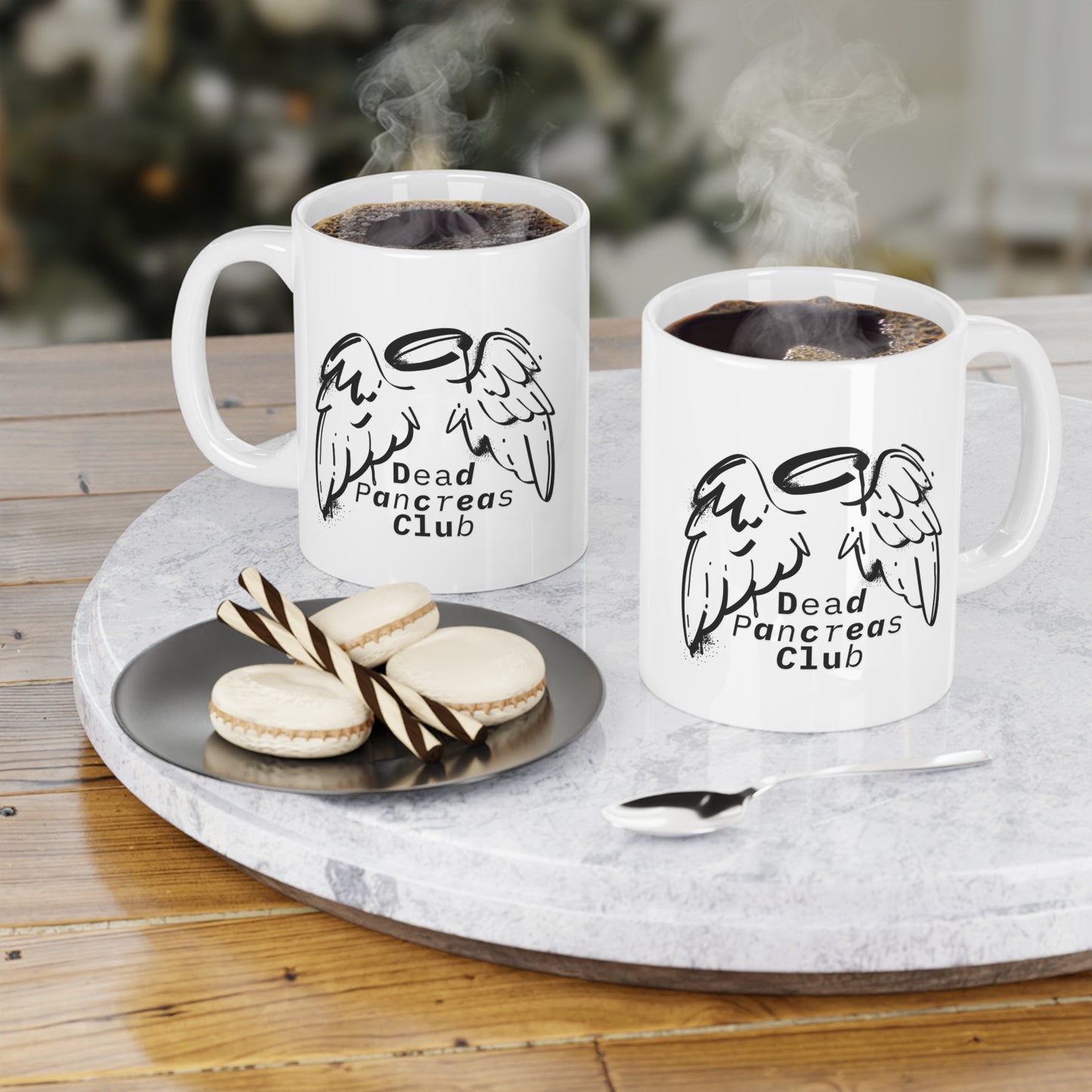 The Diabuddies Store Dead Pancreas Club (Angel Wings) - Mug 11oz Dead Pancreas Club (Angel Wings) - Mug 11oz: Welcome to the Dead Pancreas Club! This unique 11oz mug, featuring a cool angel wings design, is perfect for those with a darkly humorous take on