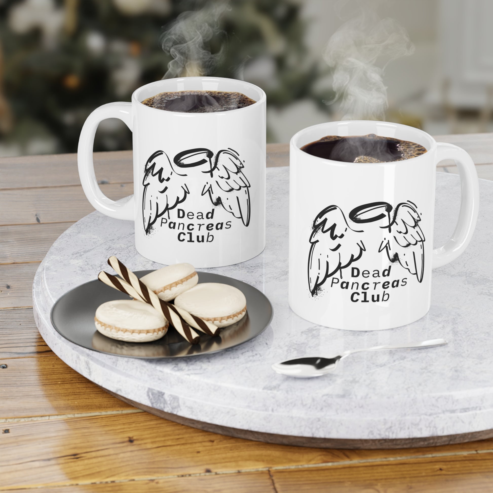The Diabuddies Store Dead Pancreas Club (Angel Wings) - Mug 11oz Dead Pancreas Club (Angel Wings) - Mug 11oz: Welcome to the Dead Pancreas Club! This unique 11oz mug, featuring a cool angel wings design, is perfect for those with a darkly humorous take on