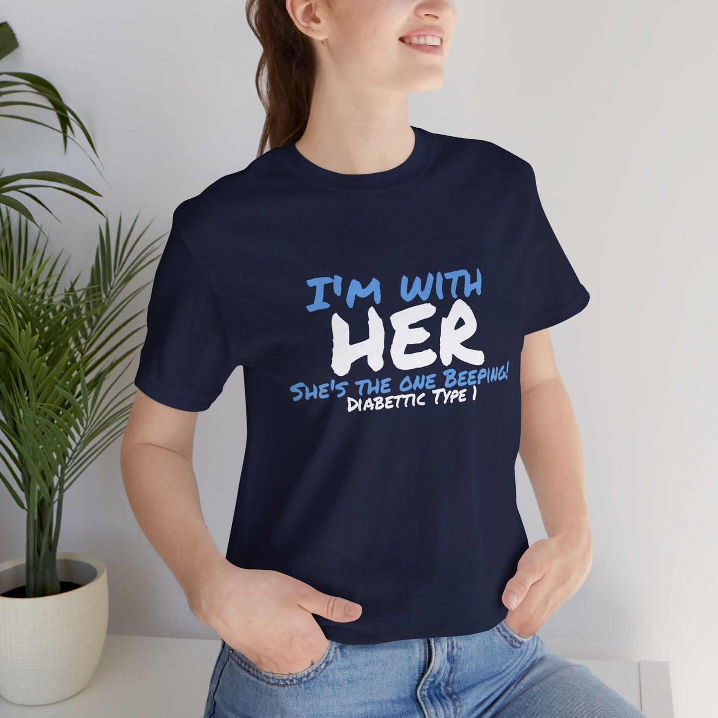 The Diabuddies Store I'm with her, she's the one beeping - Unisex Tee I'm with her, she's the one beeping - Unisex Tee: Show your solidarity with the one who keeps things running (and beeping!) with this fun and comfy tee. Perfect for anyone who supports