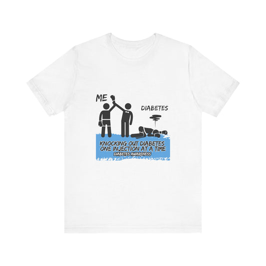 The Diabuddies Store Knocking out Diabetes - Unisex Tee Knocking out Diabetes - Unisex Tee: Make a bold statement with our Unisex Tee. This powerful shirt is for the fighters, the advocates, and the champions who face diabetes head-on every day. $22.09 T-