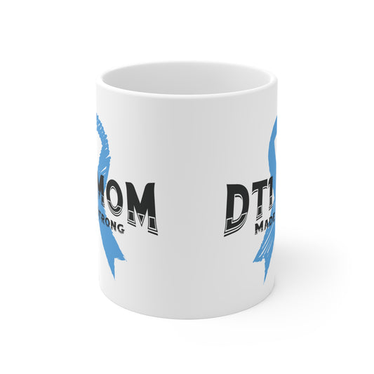 The Diabuddies Store DT1 Mom, Made Strong - Mug 11oz DT1 Mom, Made Strong - 11oz Mug: Celebrate the incredible strength of Type 1 moms with our "DT1 Mom, Made Strong" 11oz ceramic mug. It's a daily tribute to their resilience, dedication, and unwavering l