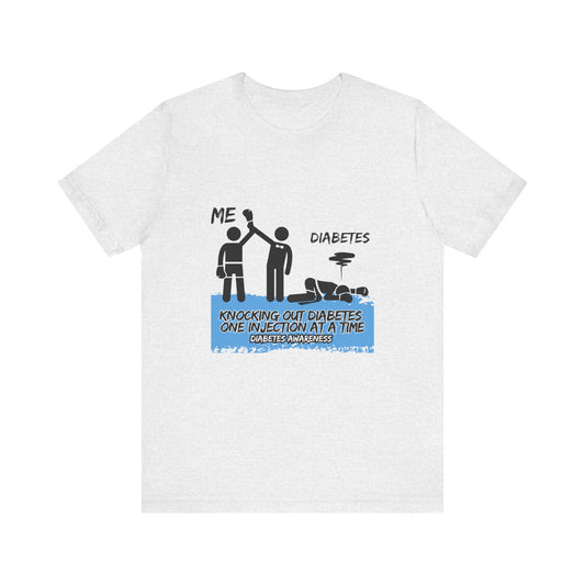 The Diabuddies Store Knocking out Diabetes - Unisex Tee Knocking out Diabetes - Unisex Tee: Make a bold statement with our Unisex Tee. This powerful shirt is for the fighters, the advocates, and the champions who face diabetes head-on every day. $22.09 T-