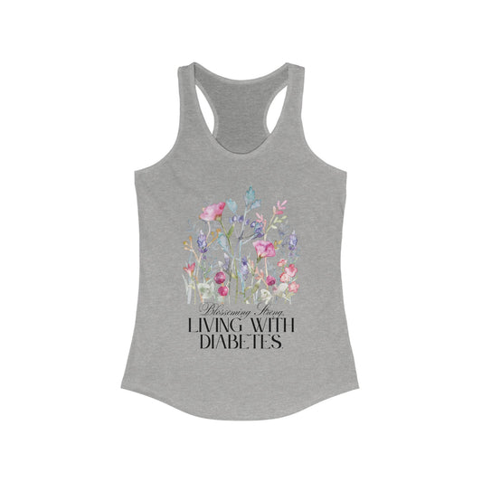 The Diabuddies Store Blossoming Strong, Living with Diabetes. - Racerback Tank Blossoming Strong, Living with Diabetes. - Racerback Tank: Wear your strength proudly! Our "Blossoming Strong, Living with Diabetes" tank is a beautiful reminder of your inner