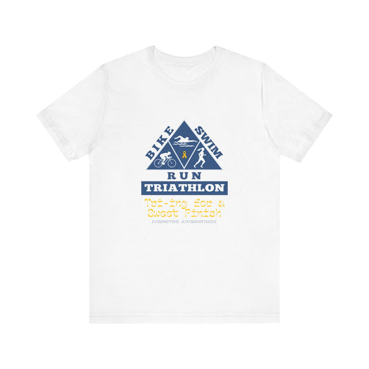 The Diabuddies Store Diabetes & Triathlon - Unisex Tee Diabetes & Triathlon - Unisex Tee: The "Tri-ing for a Sweet Finish" slogan is a powerful nod to both your athletic goals and your journey with diabetes. It's about achieving victory on your own terms.