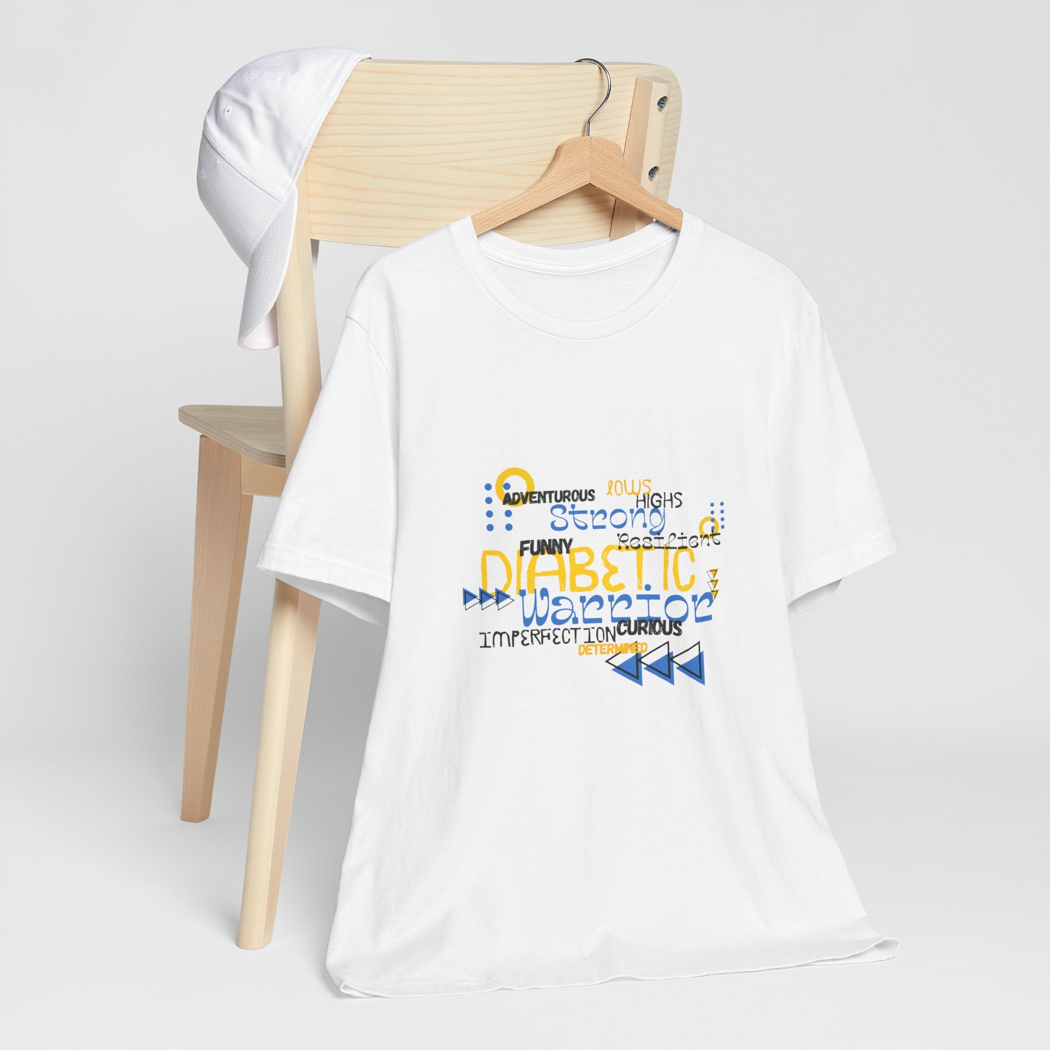 The Diabuddies Store Uplifted & Unleashed - Unisex Tee Uplifted & Unleashed - Unisex Tee: Embrace your strength, defy the odds. The "Uplifted & Unleashed" tee is more than just a shirt; it's a vibrant testament to the diabetic warrior within. Adorned with
