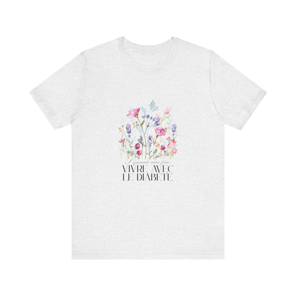 The Diabuddies Store Blossoming Strong, Living with Diabetes. (French) Unisex Tee Blossoming Strong, Living with Diabetes. (French) Unisex Tee: Wear your strength proudly! Our "S'épanouir avec force, vivre avec le diabète." Unisex Tee is a beautiful remin