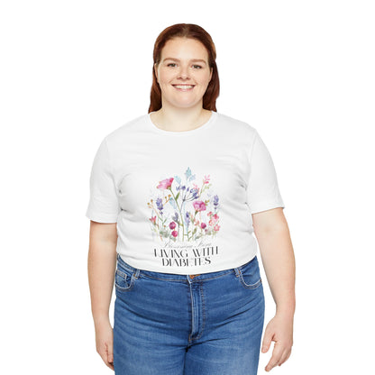 The Diabuddies Store Blossoming Strong, Living with Diabetes. - Unisex Tee Blossoming Strong, Living with Diabetes. - Unisex Tee: Wear your strength proudly! Our "Blossoming Strong, Living with Diabetes" Unisex Tee is a beautiful reminder of your inner po
