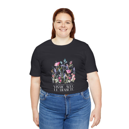 The Diabuddies Store Blossoming Strong, Living with Diabetes. (French) Unisex Tee Blossoming Strong, Living with Diabetes. (French) Unisex Tee: Wear your strength proudly! Our "S'épanouir avec force, vivre avec le diabète." Unisex Tee is a beautiful remin