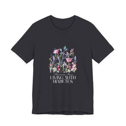 The Diabuddies Store Blossoming Strong, Living with Diabetes. - Unisex Tee Blossoming Strong, Living with Diabetes. - Unisex Tee: Wear your strength proudly! Our "Blossoming Strong, Living with Diabetes" Unisex Tee is a beautiful reminder of your inner po