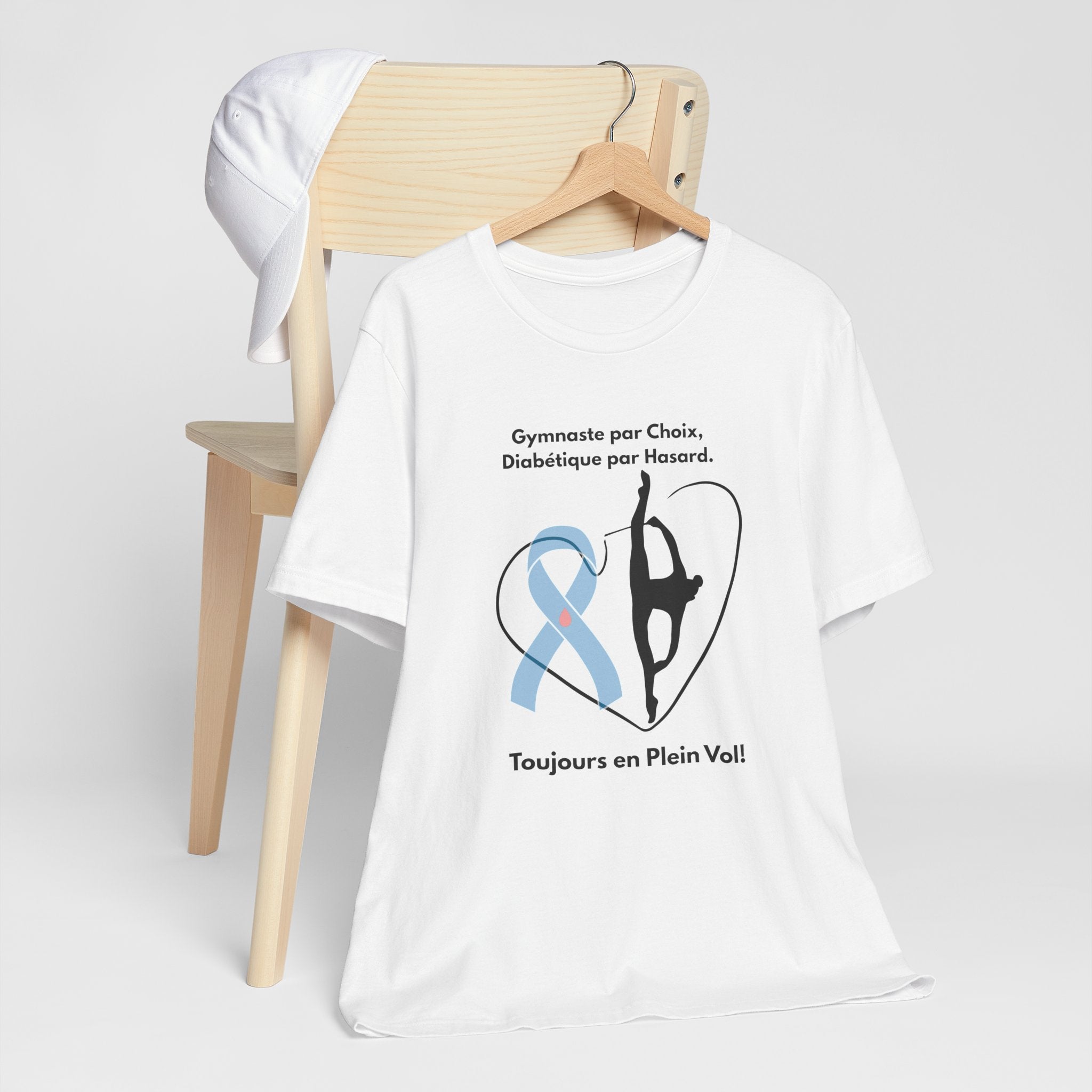 The Diabuddies Store Diabetes & Gymnastics (French) - Unisex Tee Diabetes & Gymnastics (French) - Unisex Tee: Defy expectations and tumble forward! This comfortable racerback tank is designed for the resilient gymnast who manages diabetes with grace and s