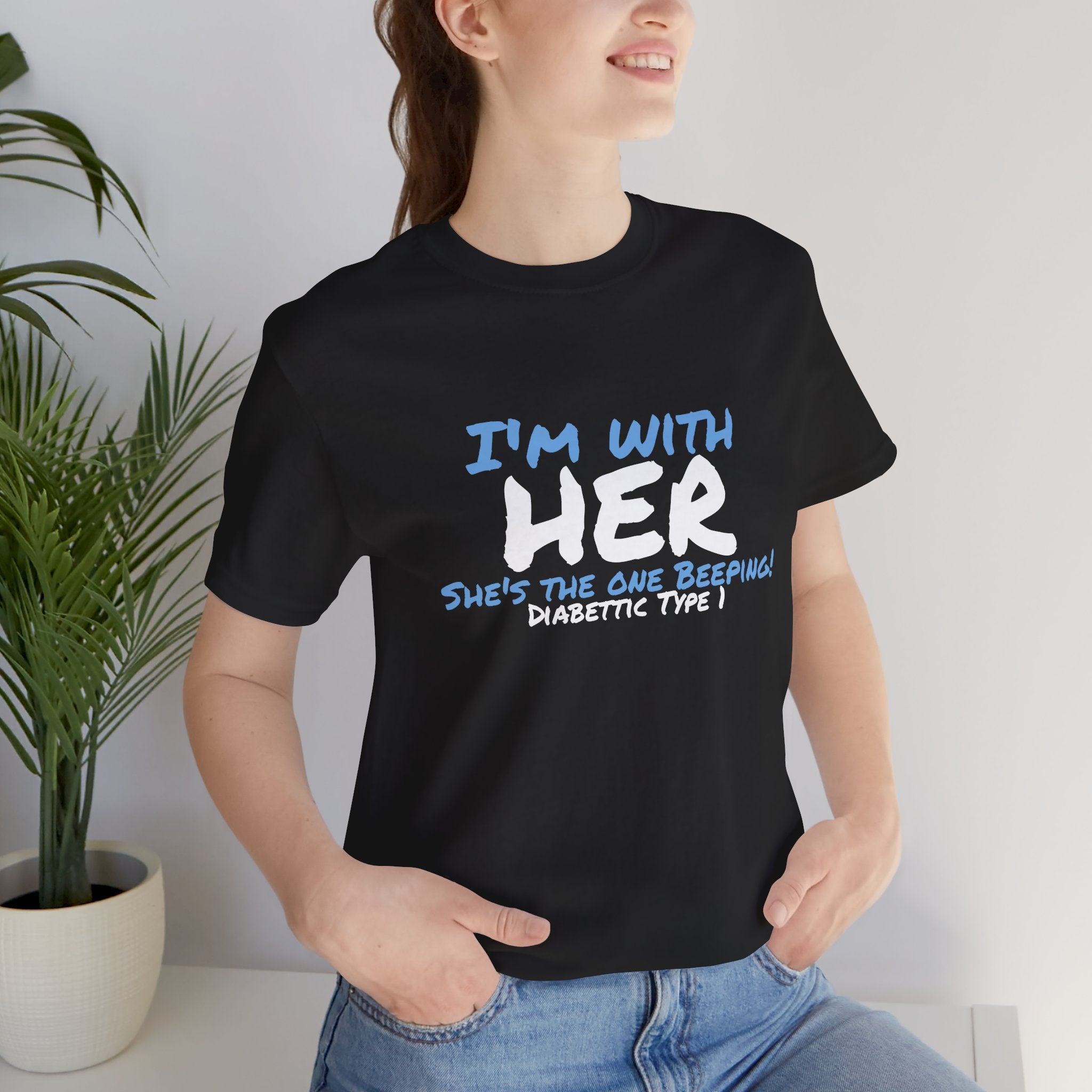 The Diabuddies Store I'm with her, she's the one beeping - Unisex Tee I'm with her, she's the one beeping - Unisex Tee: Show your solidarity with the one who keeps things running (and beeping!) with this fun and comfy tee. Perfect for anyone who supports