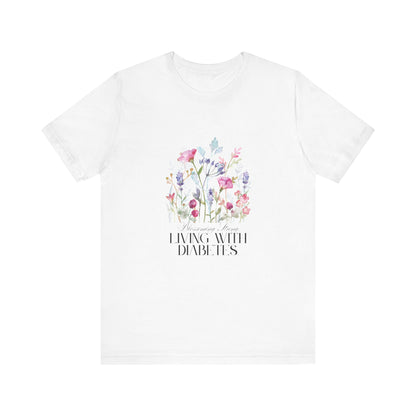 The Diabuddies Store Blossoming Strong, Living with Diabetes. - Unisex Tee Blossoming Strong, Living with Diabetes. - Unisex Tee: Wear your strength proudly! Our "Blossoming Strong, Living with Diabetes" Unisex Tee is a beautiful reminder of your inner po