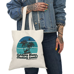 The Diabuddies Store Catching Waves, Checking my Levels - Tote Bags Catching Waves, Checking my Levels - Tote Bags: Ride the flow of life in our Tote Bag. This comfortable and stylish tank is perfect for your active lifestyle, whether you're hitting the s