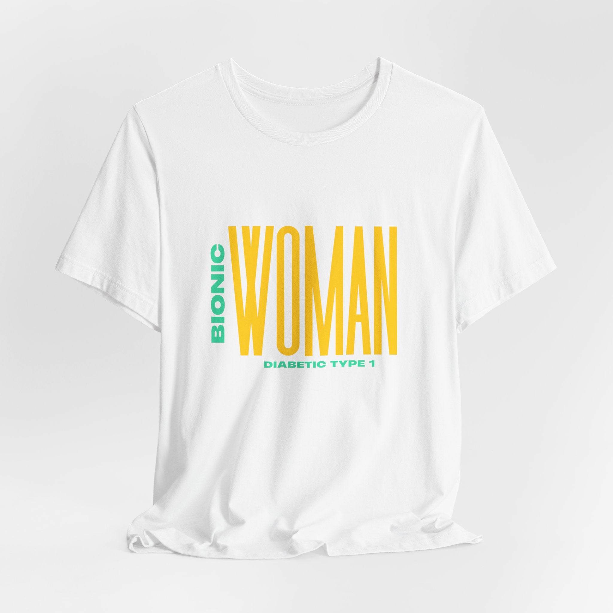 The Diabuddies Store Bionic Woman (Diabetes) - Unisex Tee Bionic Woman (Diabetes) - Unisex Tee: Unleash your inner Bionic strength! This Unisex Tee is a powerful statement of resilience, strength, and modern-day heroism for anyone living with Type 1 Diabe