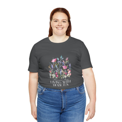 The Diabuddies Store Blossoming Strong, Living with Diabetes. - Unisex Tee Blossoming Strong, Living with Diabetes. - Unisex Tee: Wear your strength proudly! Our "Blossoming Strong, Living with Diabetes" Unisex Tee is a beautiful reminder of your inner po