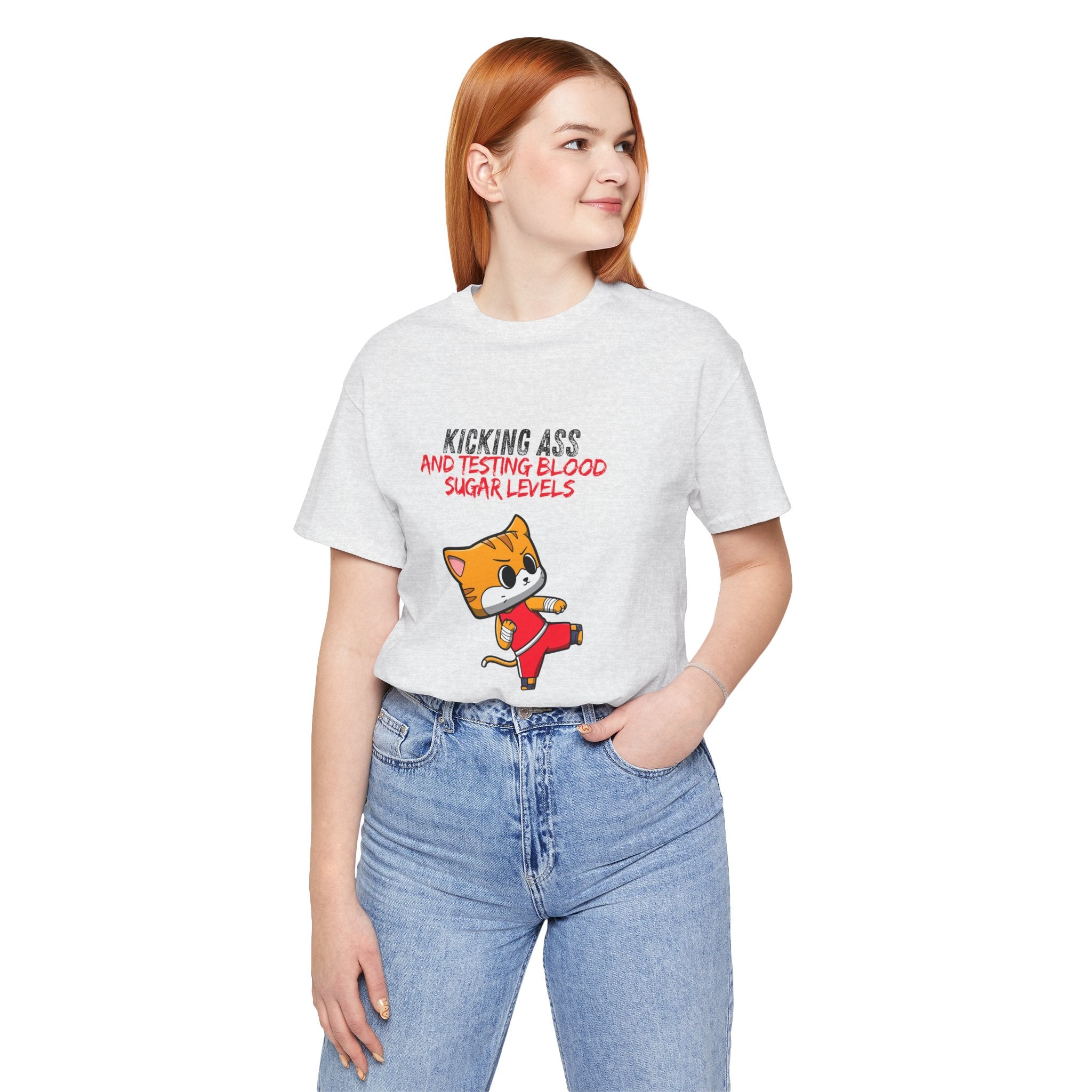 The Diabuddies Store Kicking Ass and Testing Blood Sugar Levels - Unisex Tee Kicking Ass and Testing Blood Sugar Levels - Unisex Tee: This tee is for anyone who faces their daily diabetes routine with a fighting spirit and a good dose of humor. T-Shirts $