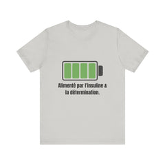 The Diabuddies Store Powered By Insulin (French) - Unisex Tee Powered By Insulin (French) - Unisex Tee: Wear your power with pride! Our "Alimenté par l'insuline et la détermination" Unisex Tee is a bold, comfortable statement of strength and gratitude. T-