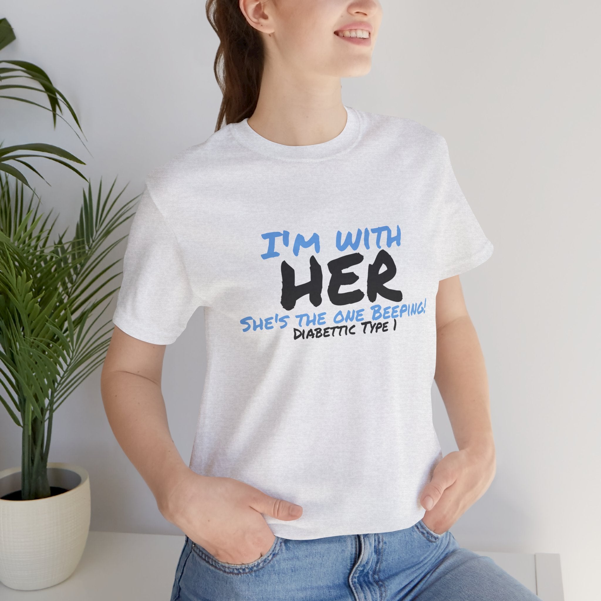 The Diabuddies Store I'm with her, she's the one beeping - Unisex Tee I'm with her, she's the one beeping - Unisex Tee: Show your solidarity with the one who keeps things running (and beeping!) with this fun and comfy tee. Perfect for anyone who supports