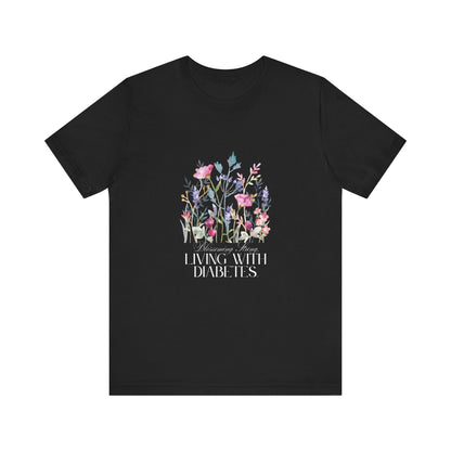 The Diabuddies Store Blossoming Strong, Living with Diabetes. - Unisex Tee Blossoming Strong, Living with Diabetes. - Unisex Tee: Wear your strength proudly! Our "Blossoming Strong, Living with Diabetes" Unisex Tee is a beautiful reminder of your inner po