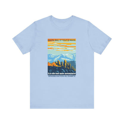 The Diabuddies Store Life is an Adventure, Highs & Lows (French) - Unisex Tee Life is an Adventure, Highs & Lows (French) - Unisex Tee: Embrace every twist and turn of your journey with our Diabetes: Life is an Adventure - French Unisex Tee. Designed for