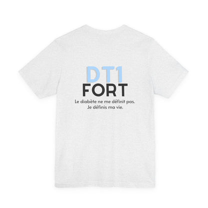 The Diabuddies Store T1D Strong (French) - Unisex Tee T1D Strong (French) - Unisex Tee: Wear your strength. This T1D Strong French tee sends a powerful message: "Le diabète ne me définit pas. Je définis ma vie." It's more than a shirt; it's a statement of