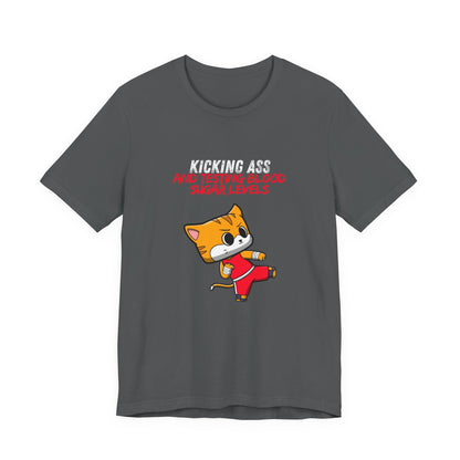 The Diabuddies Store Kicking Ass and Testing Blood Sugar Levels - Unisex Tee Kicking Ass and Testing Blood Sugar Levels - Unisex Tee: This tee is for anyone who faces their daily diabetes routine with a fighting spirit and a good dose of humor. T-Shirts $