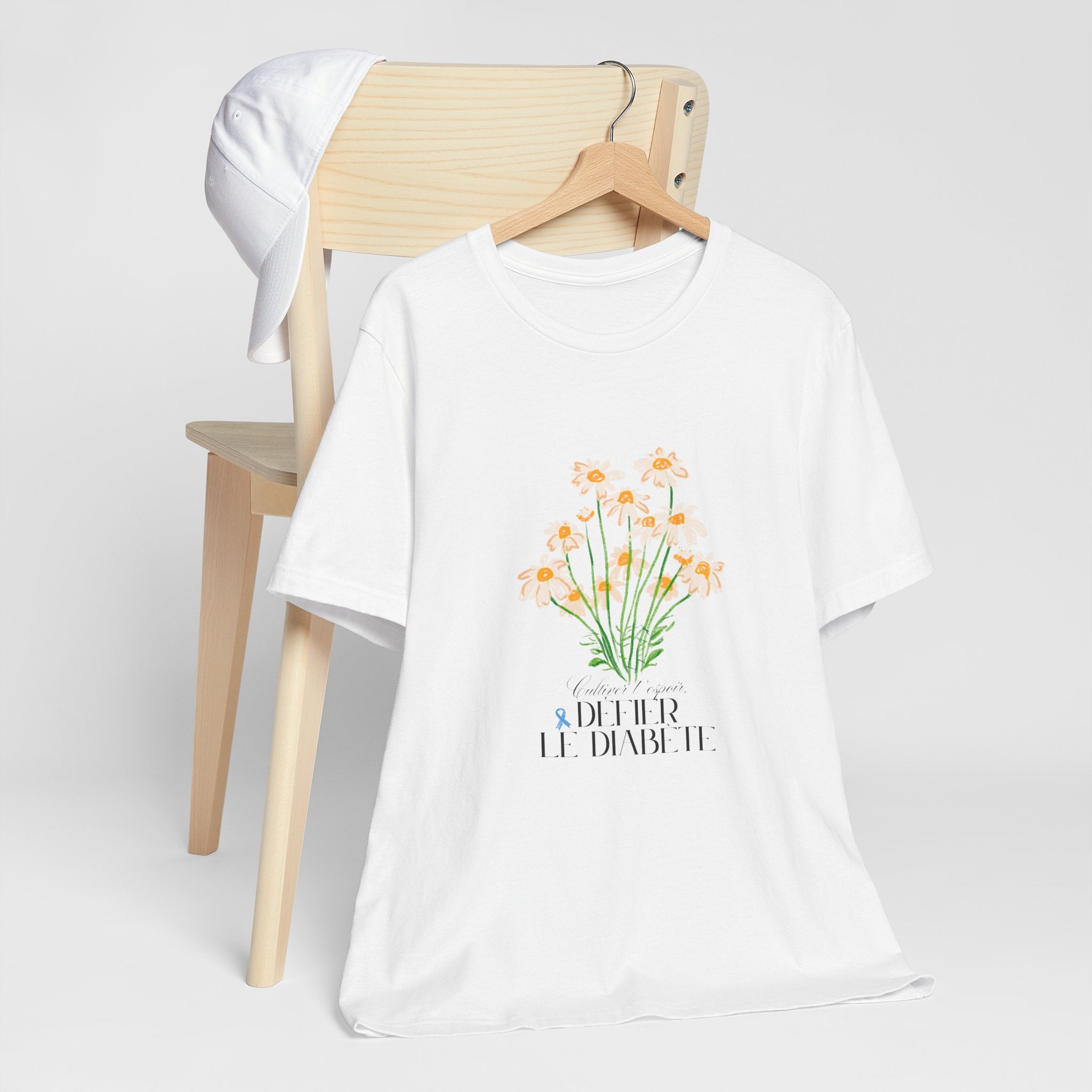 The Diabuddies Store Cultivating Hope, Defying Diabetes (French) - Unisex Tee Cultivating Hope, Defying Diabetes (French) - Unisex Tee: Wear your message of strength! Our "Cultivé l'espoir, Défié le diabète" Unisex Tee is more than just a comfortable shir