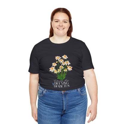 The Diabuddies Store Cultivating Hope, Defying Diabetes - Unisex Tee Cultivating Hope, Defying Diabetes - Unisex Tee: Wear your message of strength! Our "Cultivating Hope, Defying Diabetes" Unisex Tee is more than just a comfortable shirt; it's a powerful