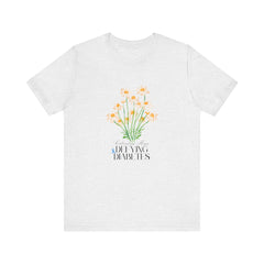 The Diabuddies Store Cultivating Hope, Defying Diabetes - Unisex Tee Cultivating Hope, Defying Diabetes - Unisex Tee: Wear your message of strength! Our "Cultivating Hope, Defying Diabetes" Unisex Tee is more than just a comfortable shirt; it's a powerful