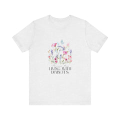 The Diabuddies Store Blossoming Strong, Living with Diabetes. - Unisex Tee Blossoming Strong, Living with Diabetes. - Unisex Tee: Wear your strength proudly! Our "Blossoming Strong, Living with Diabetes" Unisex Tee is a beautiful reminder of your inner po