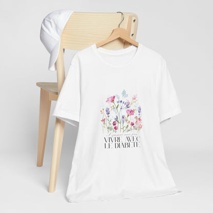 The Diabuddies Store Blossoming Strong, Living with Diabetes. (French) Unisex Tee Blossoming Strong, Living with Diabetes. (French) Unisex Tee: Wear your strength proudly! Our "S'épanouir avec force, vivre avec le diabète." Unisex Tee is a beautiful remin