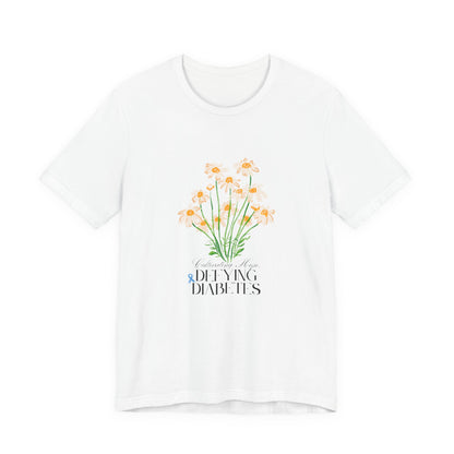 The Diabuddies Store Cultivating Hope, Defying Diabetes - Unisex Tee Cultivating Hope, Defying Diabetes - Unisex Tee: Wear your message of strength! Our "Cultivating Hope, Defying Diabetes" Unisex Tee is more than just a comfortable shirt; it's a powerful