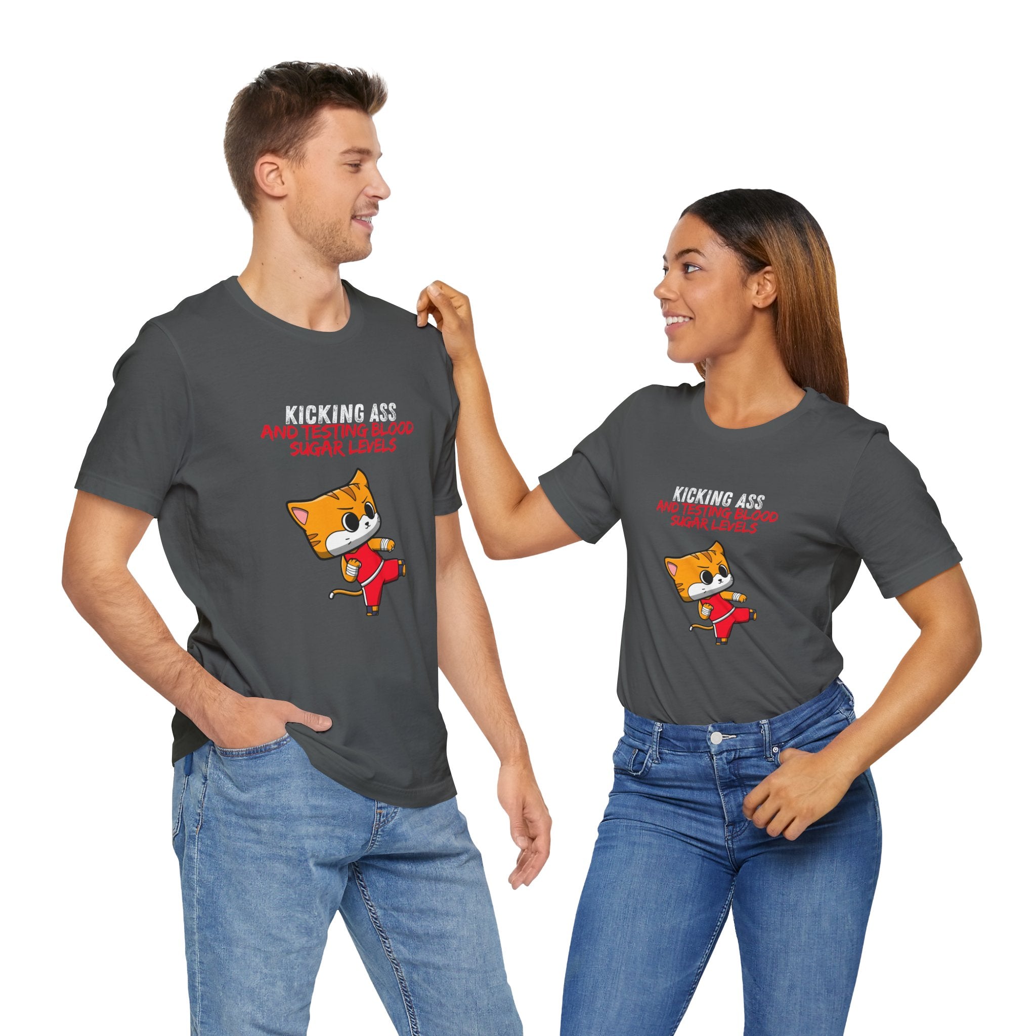 The Diabuddies Store Kicking Ass and Testing Blood Sugar Levels - Unisex Tee Kicking Ass and Testing Blood Sugar Levels - Unisex Tee: This tee is for anyone who faces their daily diabetes routine with a fighting spirit and a good dose of humor. T-Shirts $