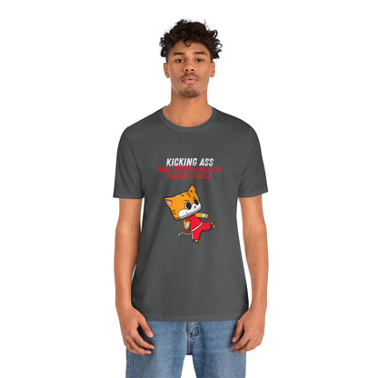 The Diabuddies Store Kicking Ass and Testing Blood Sugar Levels - Unisex Tee Kicking Ass and Testing Blood Sugar Levels - Unisex Tee: This tee is for anyone who faces their daily diabetes routine with a fighting spirit and a good dose of humor. T-Shirts $