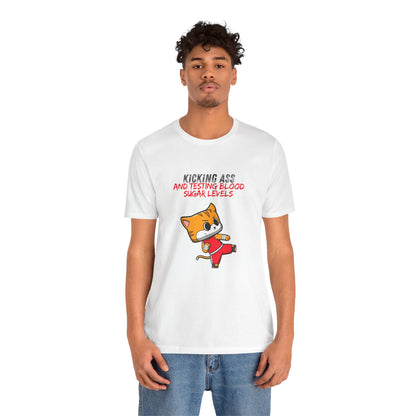 The Diabuddies Store Kicking Ass and Testing Blood Sugar Levels - Unisex Tee Kicking Ass and Testing Blood Sugar Levels - Unisex Tee: This tee is for anyone who faces their daily diabetes routine with a fighting spirit and a good dose of humor. T-Shirts $