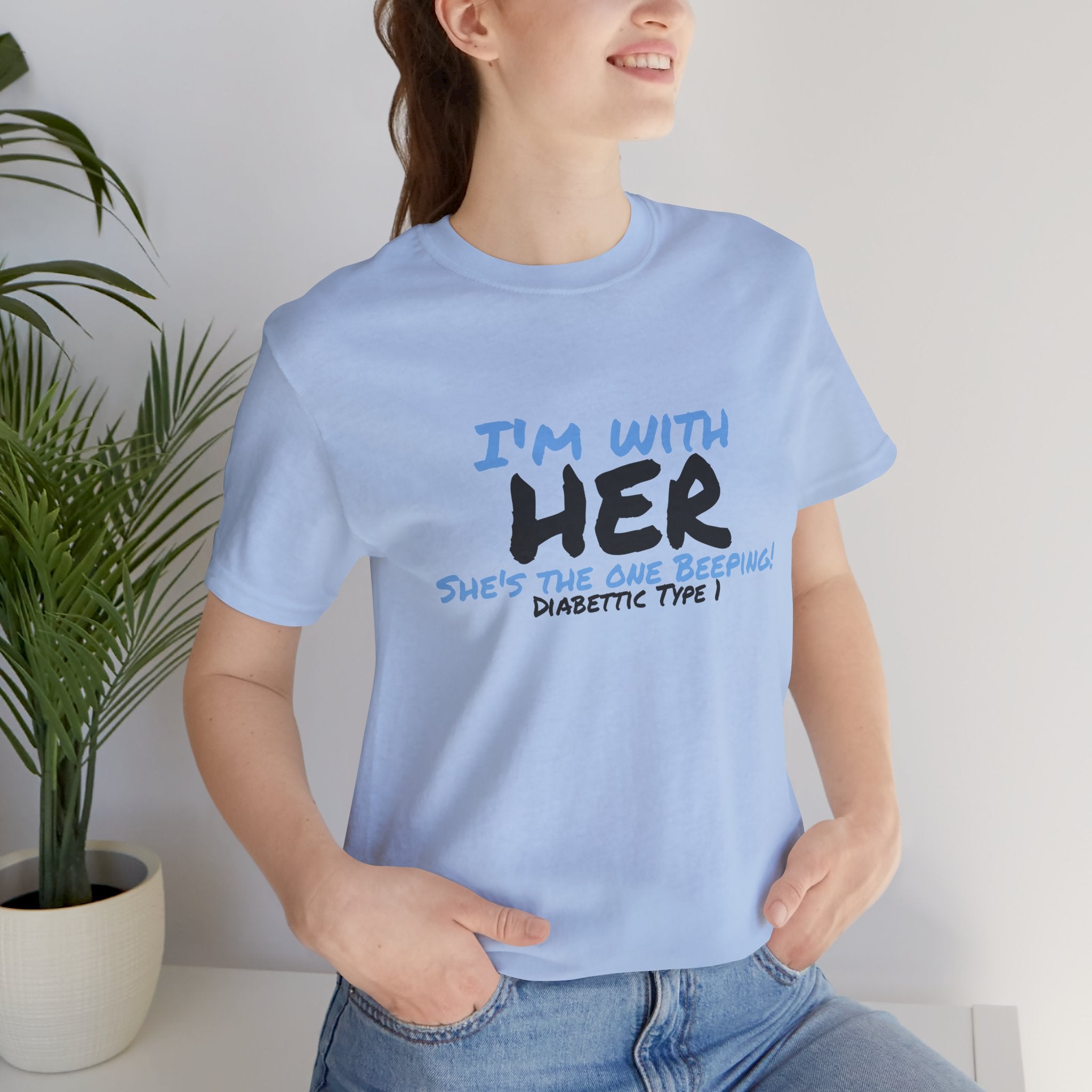 The Diabuddies Store I'm with her, she's the one beeping - Unisex Tee I'm with her, she's the one beeping - Unisex Tee: Show your solidarity with the one who keeps things running (and beeping!) with this fun and comfy tee. Perfect for anyone who supports