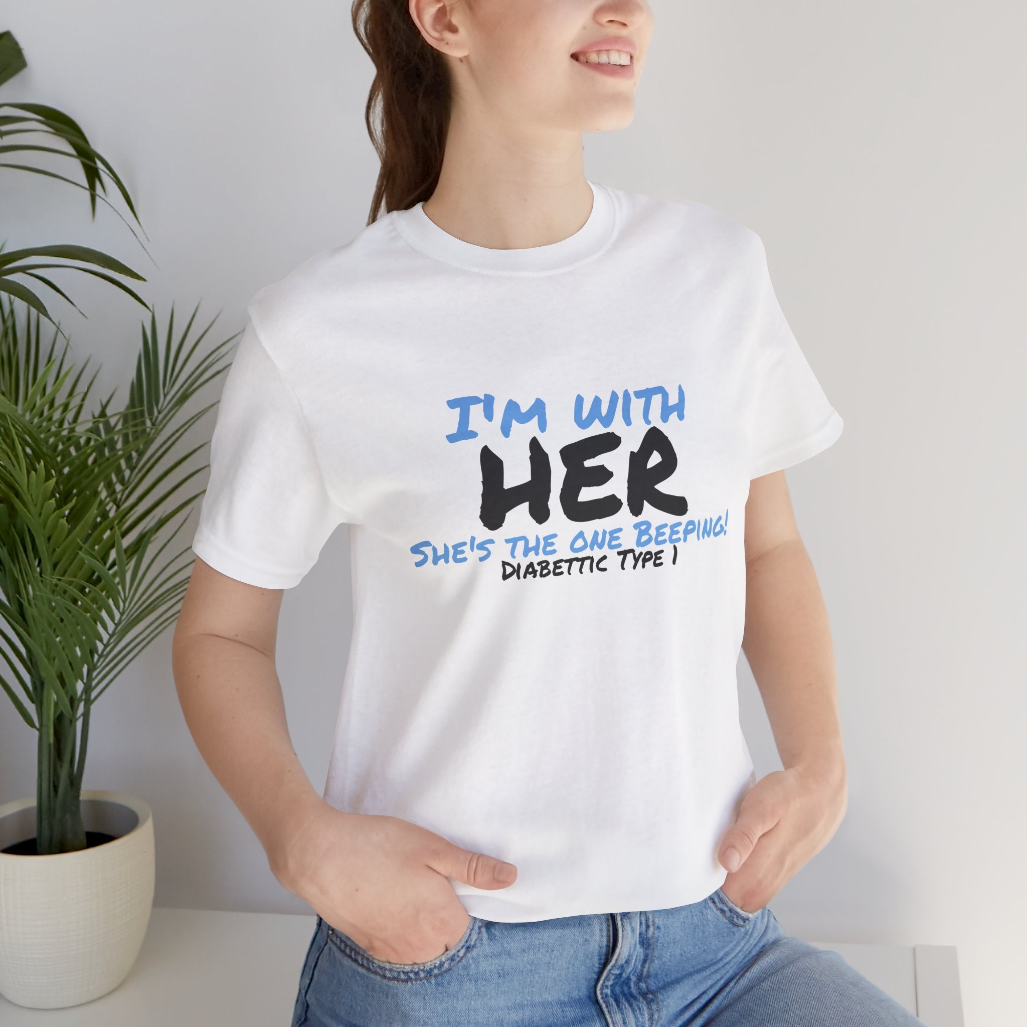 The Diabuddies Store I'm with her, she's the one beeping - Unisex Tee I'm with her, she's the one beeping - Unisex Tee: Show your solidarity with the one who keeps things running (and beeping!) with this fun and comfy tee. Perfect for anyone who supports