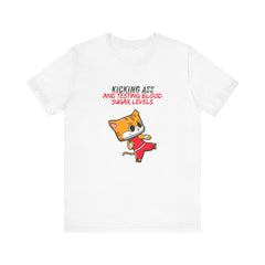 The Diabuddies Store Kicking Ass and Testing Blood Sugar Levels - Unisex Tee Kicking Ass and Testing Blood Sugar Levels - Unisex Tee: This tee is for anyone who faces their daily diabetes routine with a fighting spirit and a good dose of humor. T-Shirts $