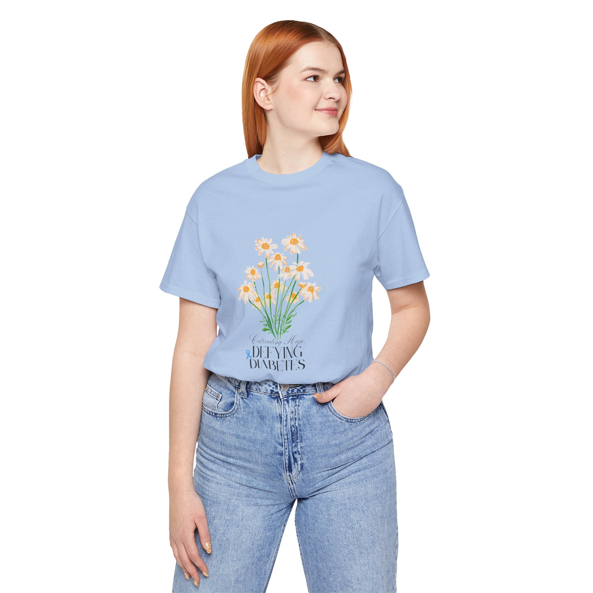 The Diabuddies Store Cultivating Hope, Defying Diabetes - Unisex Tee Cultivating Hope, Defying Diabetes - Unisex Tee: Wear your message of strength! Our "Cultivating Hope, Defying Diabetes" Unisex Tee is more than just a comfortable shirt; it's a powerful