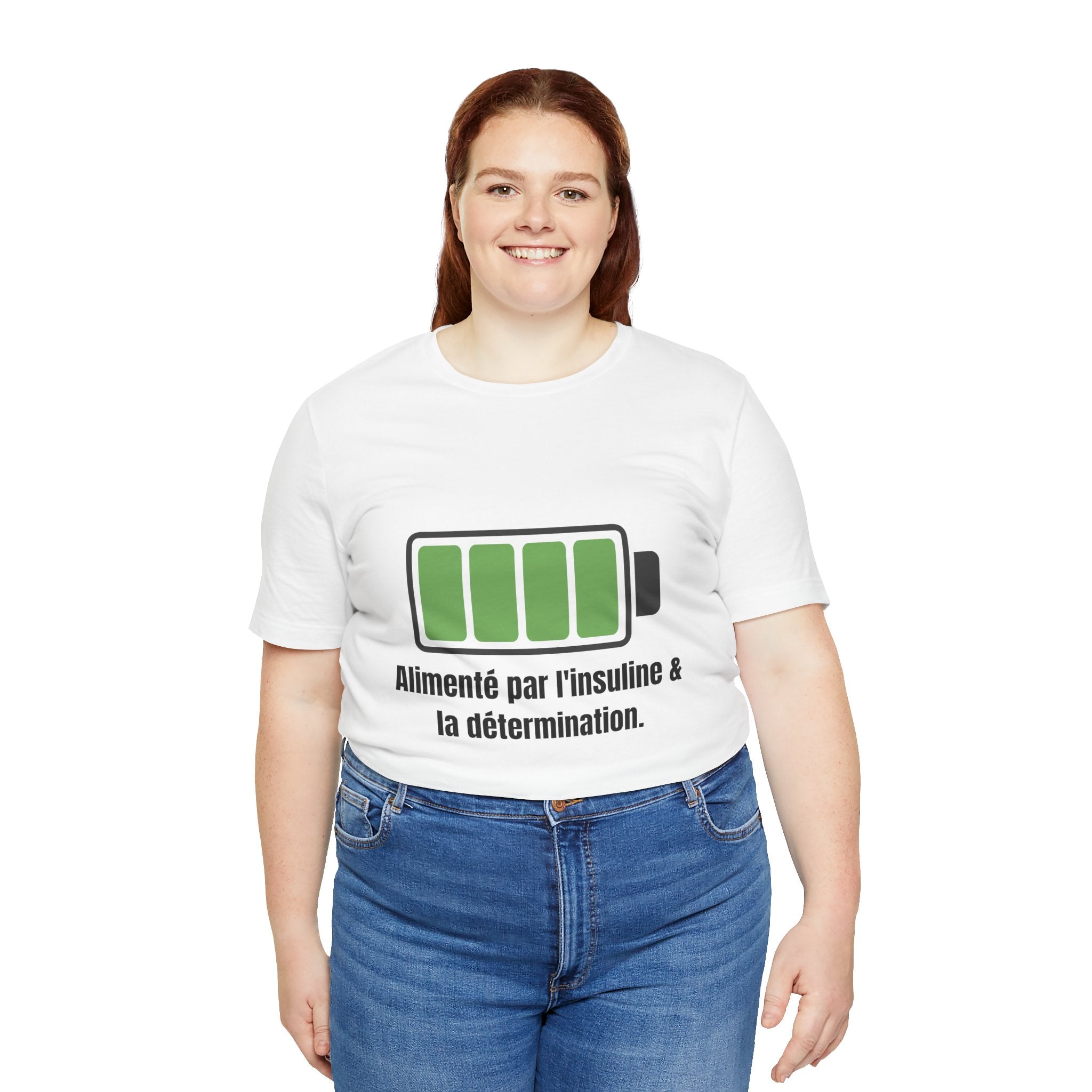 The Diabuddies Store Powered By Insulin (French) - Unisex Tee Powered By Insulin (French) - Unisex Tee: Wear your power with pride! Our "Alimenté par l'insuline et la détermination" Unisex Tee is a bold, comfortable statement of strength and gratitude. T-
