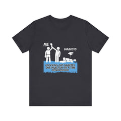 The Diabuddies Store Knocking out Diabetes - Unisex Tee Knocking out Diabetes - Unisex Tee: Make a bold statement with our Unisex Tee. This powerful shirt is for the fighters, the advocates, and the champions who face diabetes head-on every day. T-Shirts