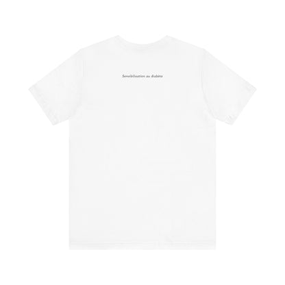The Diabuddies Store Blossoming Strong, Living with Diabetes. (French) Unisex Tee Blossoming Strong, Living with Diabetes. (French) Unisex Tee: Wear your strength proudly! Our "S'épanouir avec force, vivre avec le diabète." Unisex Tee is a beautiful remin