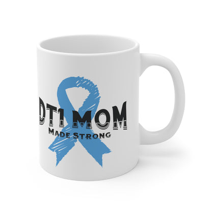 The Diabuddies Store DT1 Mom, Made Strong - Mug 11oz DT1 Mom, Made Strong - 11oz Mug: Celebrate the incredible strength of Type 1 moms with our "DT1 Mom, Made Strong" 11oz ceramic mug. It's a daily tribute to their resilience, dedication, and unwavering l