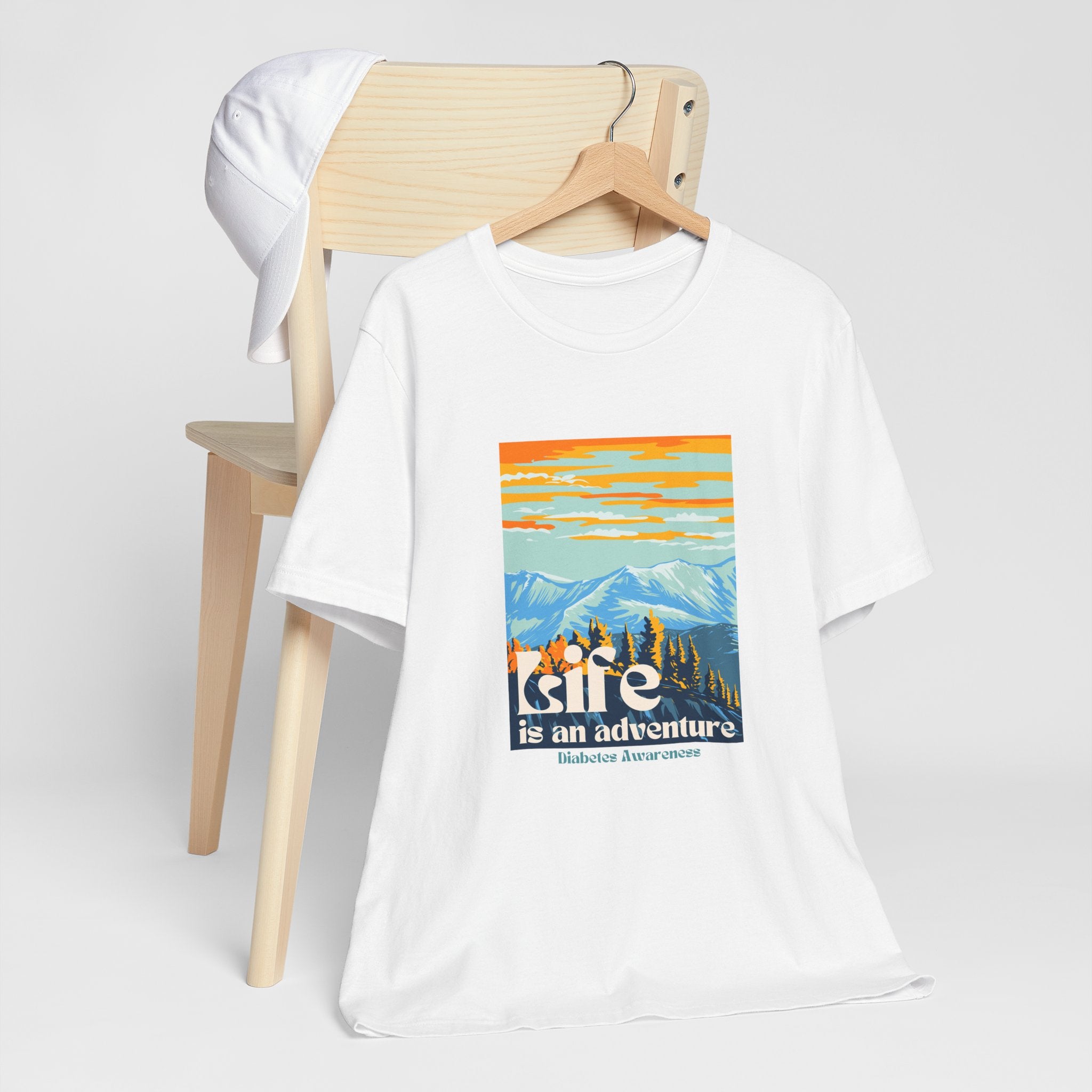The Diabuddies Store Life is an Adventure, Mountains - Unisex Tee Life is an Adventure, Mountains - Unisex Tee: Soul in the outdoors? This tee's for you! Embrace nature's call, from peaks to trails. Your adventure starts here. T-Shirts $22.50